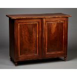 A pair of George III mahogany cabinets by Gillows of Lancaster, each boxwood strung top above a pair