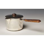 A Victorian silver brandy pan, the detachable lid with a hinged spout cover and turned wood