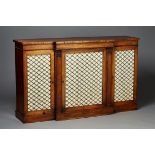 A Regency rosewood breakfront library bookcase, in the manner of Gillows of Lancaster, fitted with