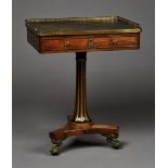 A Regency rosewood and gilt metal mounted writing table, attributed to Gillows of Lancaster, the