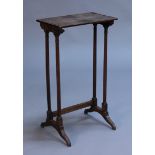 A Regency mahogany nest table, the rectangular top above turned legs and bracket supports, height