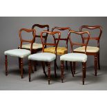 A harlequin set of four mid-Victorian rosewood spoon back chairs and a similar pair of chairs, all