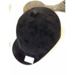 A Pytchley riding hat, size 7.