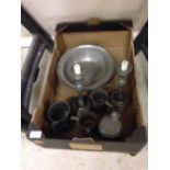 A quantity of vintage pewter to include large bowl, candlesticks and tankards - German.