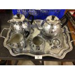 Silver plated tea service on tray.