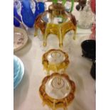 A large c.1970's gold & clear glass ceiling light shade with 2 matching smaller shades.