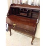 A rosewood bureau with brass inlay decoration. 112 x 92 x 37cm.