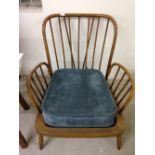 An Ercol armchair.