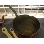 A large copper pan 31cm diameter.