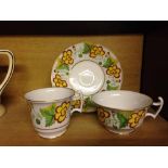 An early 19th century hand painted Spode trio with London shape handle