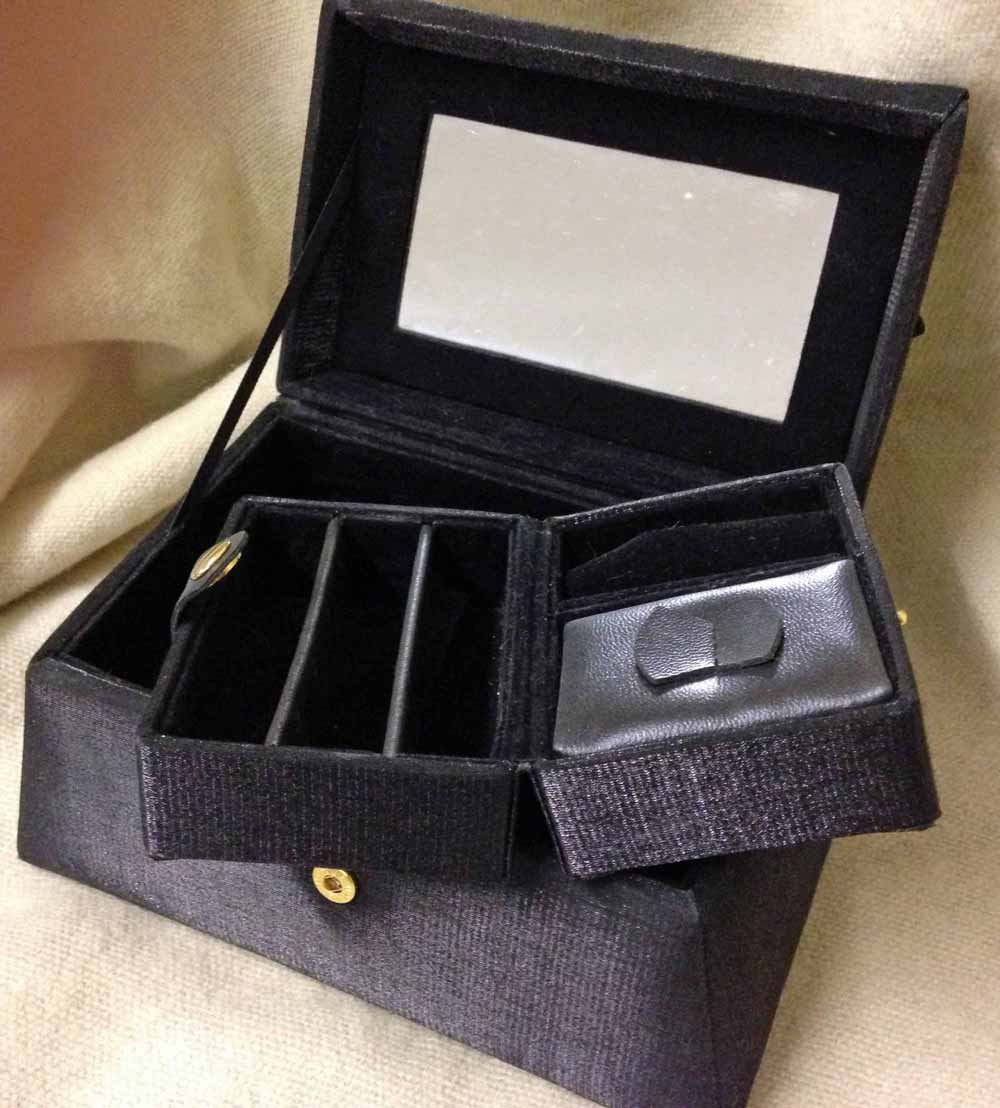 Black jewellery box with internal travelling jewel case.