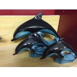 3 Poole Pottery dolphins. 2 sizes.