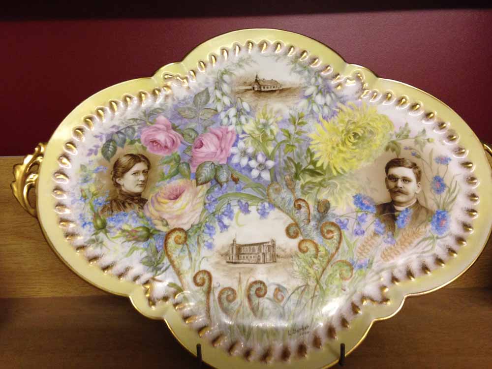 An antique fine hand-painted platter signed L. Barber 1904