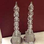 A pair of cut glass table lamps