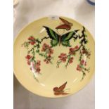 A Royal Doulton hand painted butterfly pattern footed bowl.