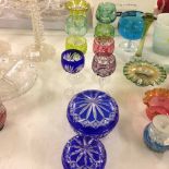 10 pieces of coloured Bohemian glass.