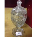 An antique glass crystal cut lidded vase, possibly Irish.