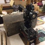 A vintage French Pathescope hand cine projector c.1930's with original box.