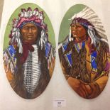 2 hand painted glass plaques depicting native American Indians 36cm long.