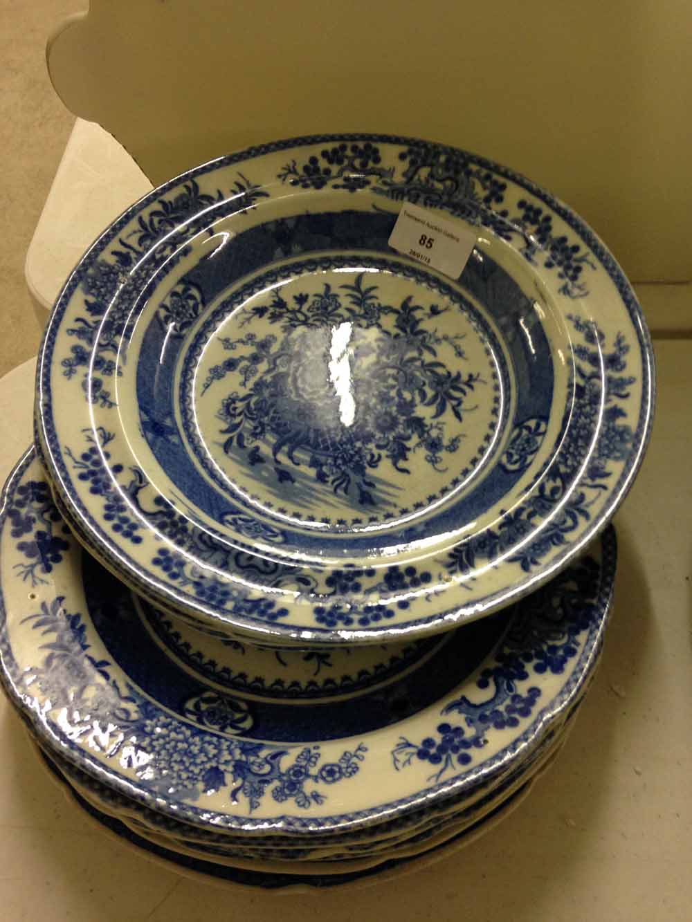 9 early Spode blue & white plates: 7 x flower basket pattern and 2 cricket pattern