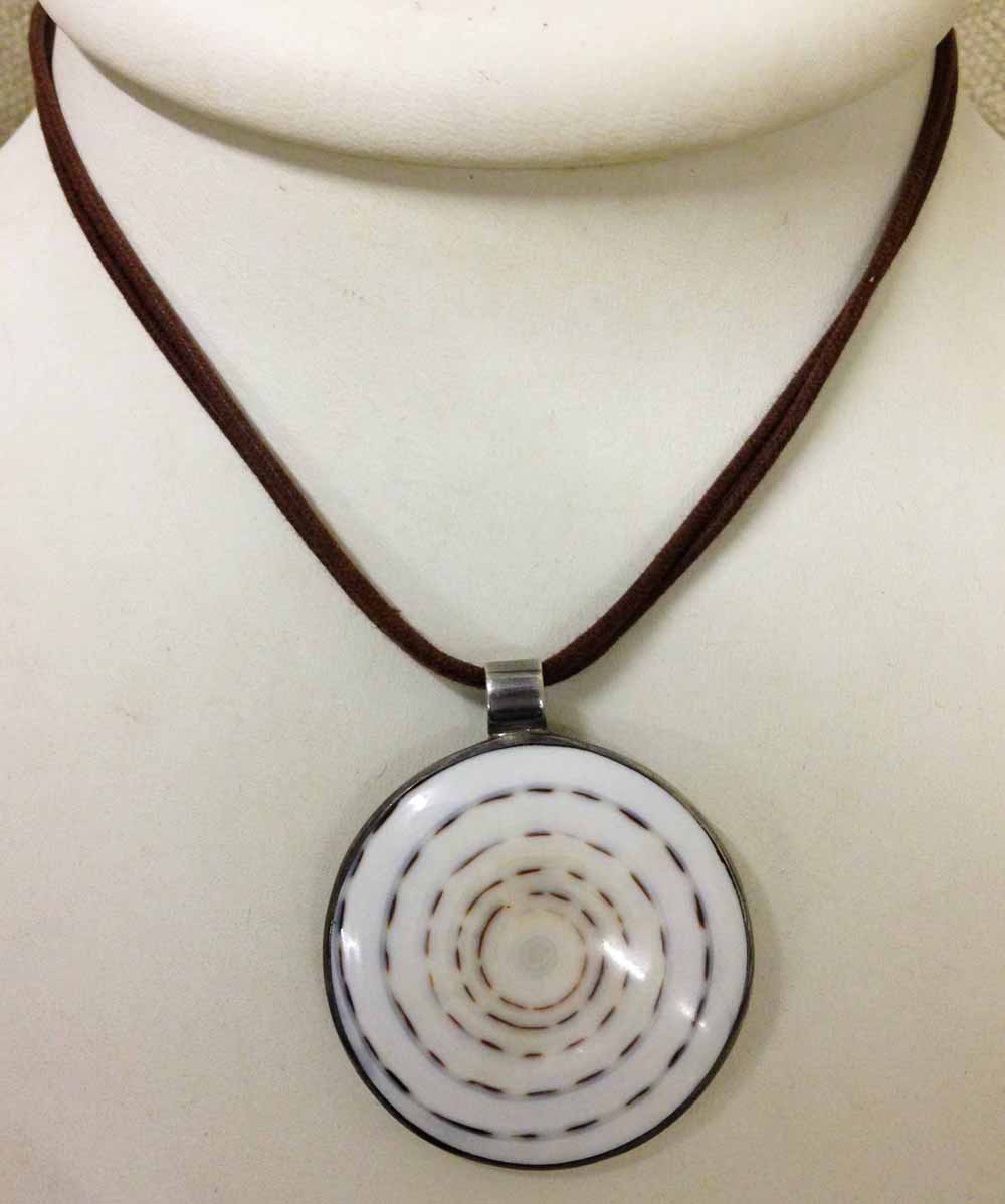A shell necklace mounted in silver - maker Tribal Spirit