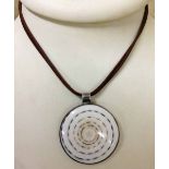 A shell necklace mounted in silver - maker Tribal Spirit
