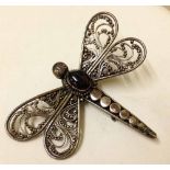 925 silver dragonfly brooch with filligree wings and central cabouchon.