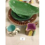 6 pieces of majolica to include charger plates, dish & jugs.