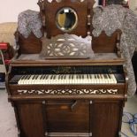 A Victorian bellows organ by William James Ltd