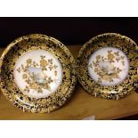 A pair of antique Limoges hand painted & gilt cabinet plates with landscape scenes