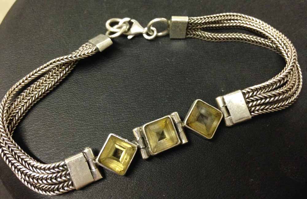 Ladies art deco style 925 silver bracelet with 3 square cut clear stones. Approx 19cm.