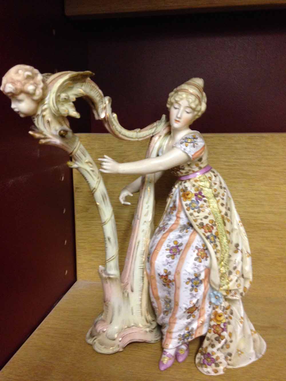 An antique continental porcelain harpist figure a/f