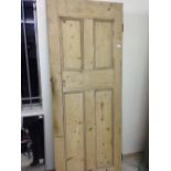 Stripped pine door. 199 x 82cm.