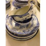 8 pieces of 19th century blue & white - plates, bowls & sauce boat