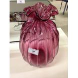 A hand blown cranberry glass vase, 26cm.