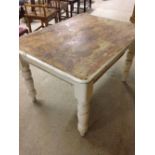 A vintage pine kitchen table white painted legs. 4' x 3'.