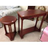 A modern hall table with matching side/telephone table.