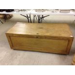 A large vintage pine linen chest on casters. 54 x 143 x 62cm.