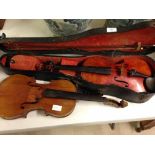 2 vintage violins in need of restoration, one bow and case.