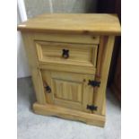 A Corona pine bedside cabinet