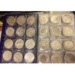 Folder of 72 world coins.