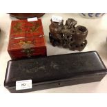 2 oriental boxes with a soapstone carving.