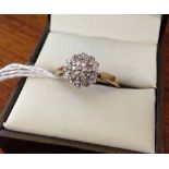 9ct gold diamond cluster ring, 0.05 carat diamond weight. Size P.