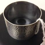 A silver napkin ring.