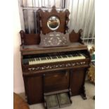 A Victorian bellows organ by William James Ltd