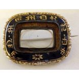 A Victorian mourning brooch - missing front glass with lock of hair.