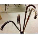 4 silver top walking sticks (2 HM silver, 1 800 continental silver, 1 unmarked).