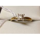 Ladies 9ct gold ring with square top set with 9 small diamonds. Size O.