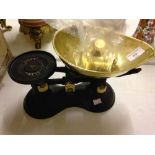 A pair of vintage Victor weighing scales with brass imperial weights.