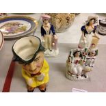 3 x 19th Century small Staffordshire figures and a Thatcher Toby jug